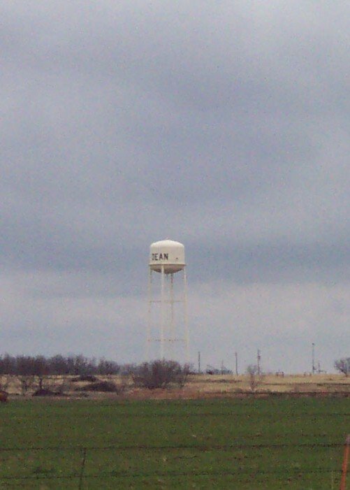 This photo is representative of our new home in Dean,  Texas.  We'll be moving there soon and we're looking forward to living out in the country.  The dominant feature of the skyline is the Dean water tower.  Does that tell you anything?  :)