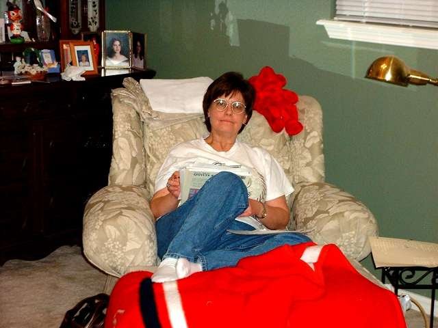 Here is Elizabeth all decked out for Opening Day 2001!  She has her Cardinals blanket,  Cardinals shirt, Fred Bird on the dresser, and Mark McGwire bear on her chair!