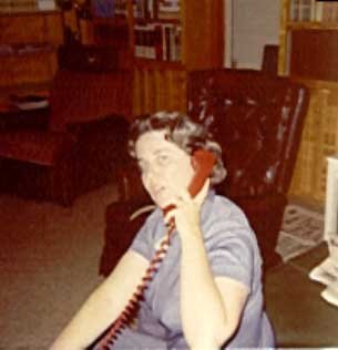 Momma doing her thing, dig that red telephone!